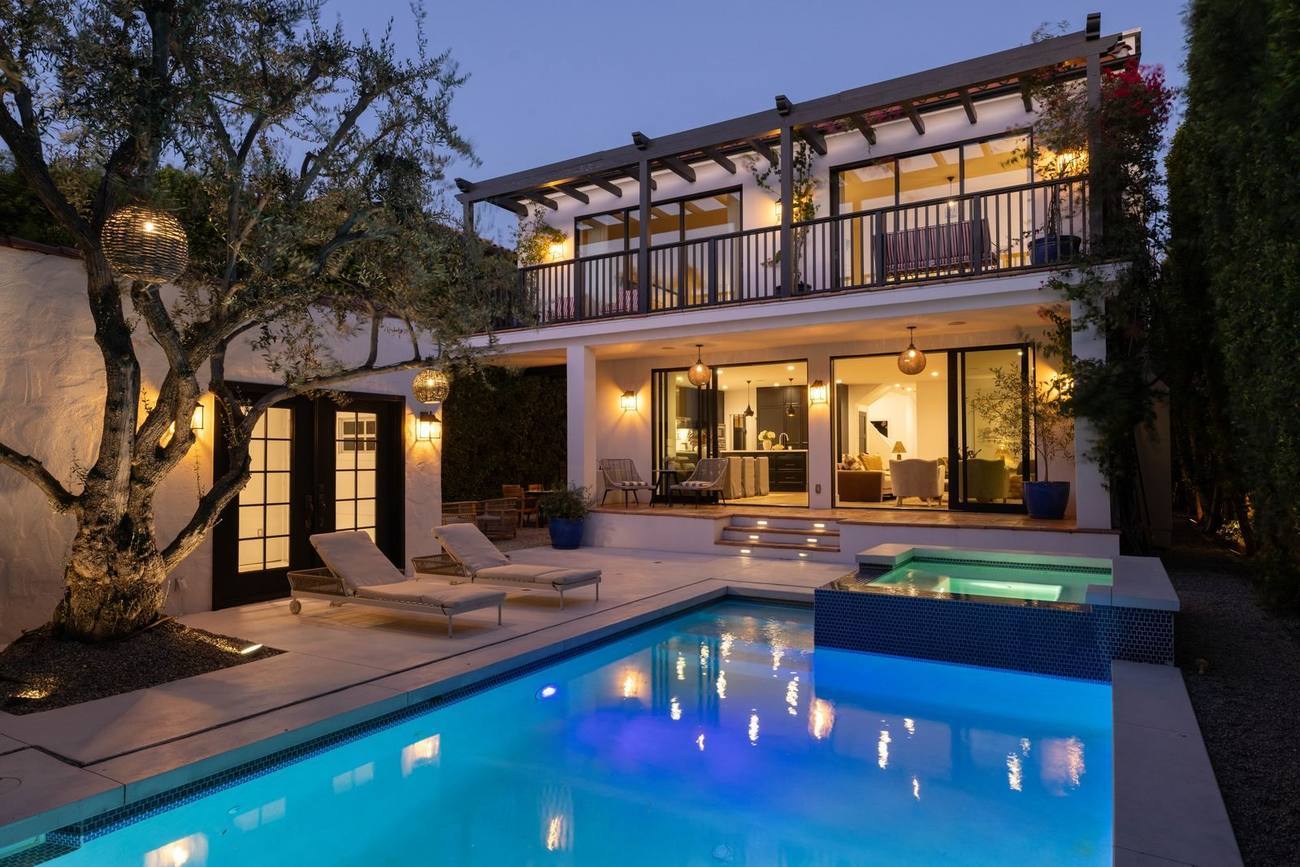 Pool and rear exterior at dusk, 113 N La Jolla Avenue, Beverly Grove