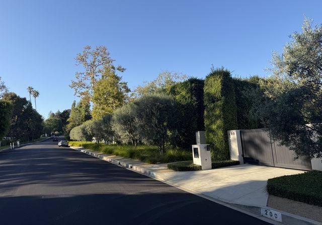A hedged estate entrance in Pacific Palisades