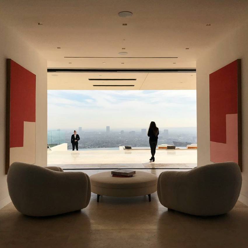 Living room opening straight onto the hillside view