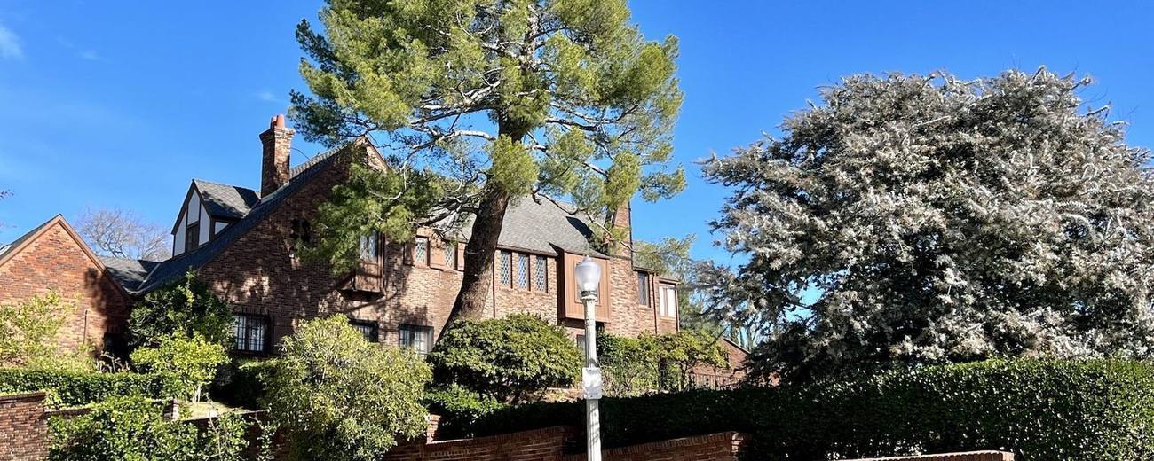 A brick estate behind a wall on a Los Feliz street