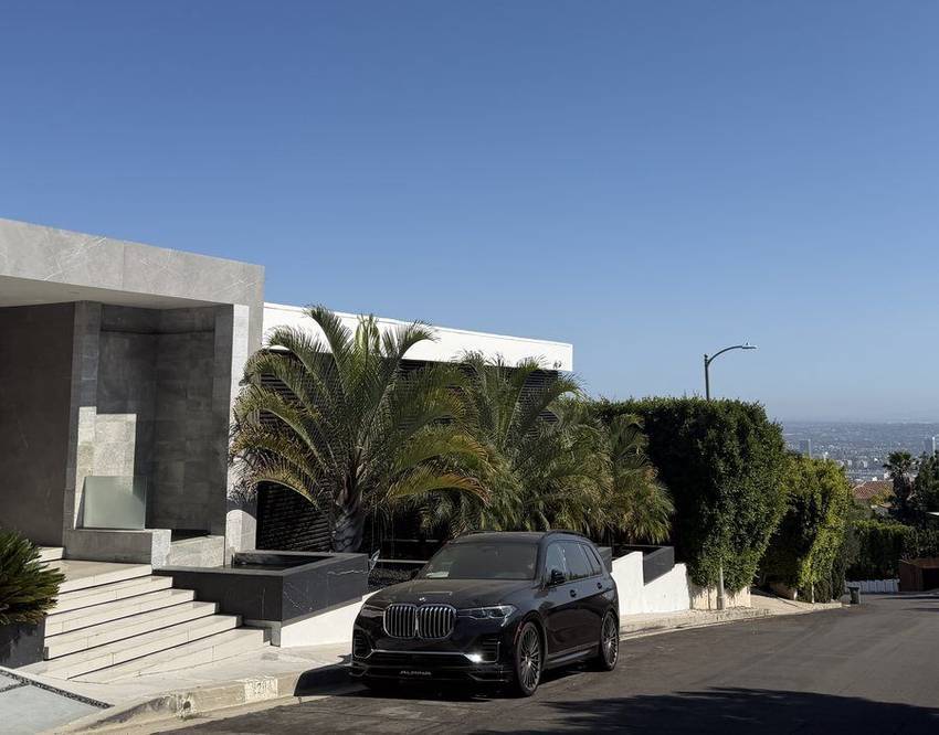 A modern house on a level pad above the basin, Mount Olympus