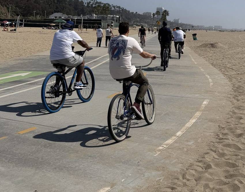 Cyclists on the beach bike path below the Santa Monica bluffs