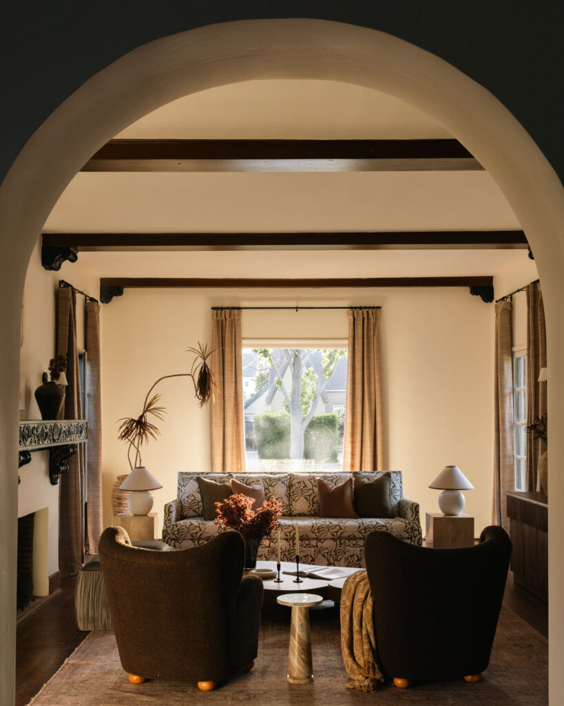 Living room through an archway, Miracle Mile character home